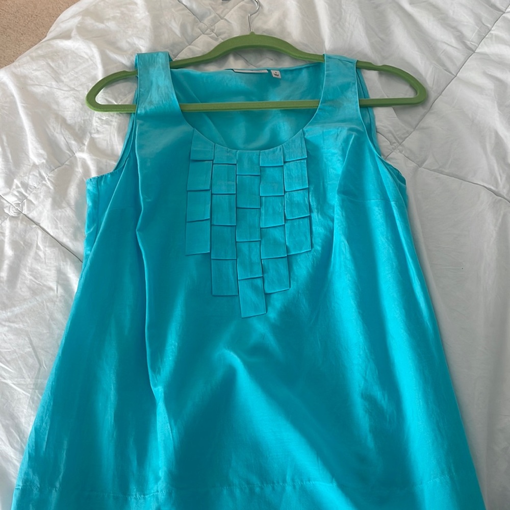 Halogen sleeveless top